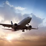 Airplane landing or taking off in susnet light.SEE MY OTHER SIMILAR PHOTOS: